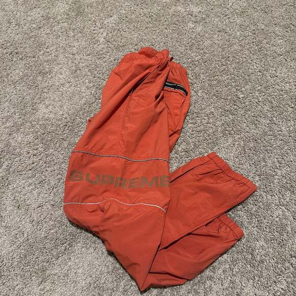 Supreme Nylon Reflective Logo Track Pants. Orange....